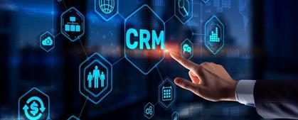 Main features of CRM software with icons and a hand pointing to "CRM".